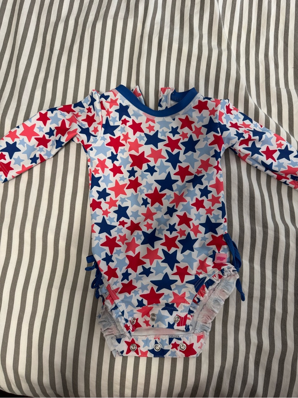 Rufflebutts Baby Long-Sleeve Star Print One-Piece Swimsuit - Red & Blue